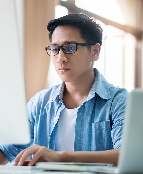 Man using computer keyboard.