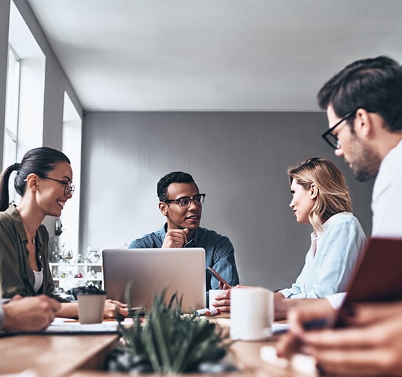 People in conference room having a meeting.