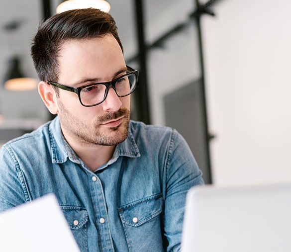 Man looking at computer screen.