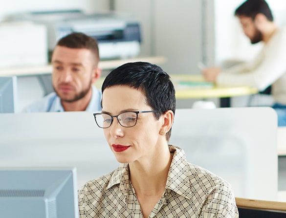 Image of woman working on a computer.