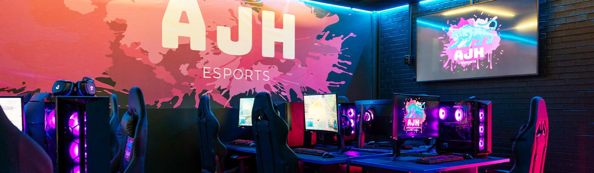Neon lit esports game room.