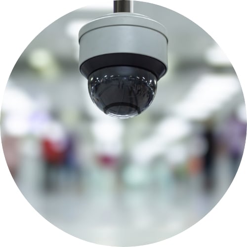 A ceiling mounted security camera in a retail store.