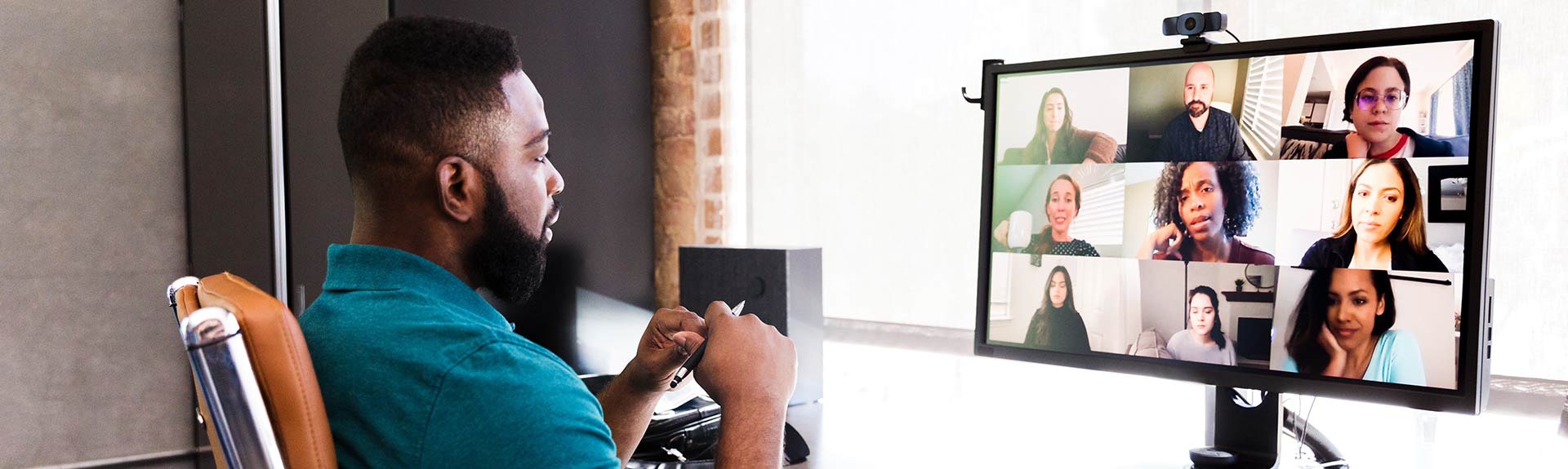 Person attending a meeting while working from home.