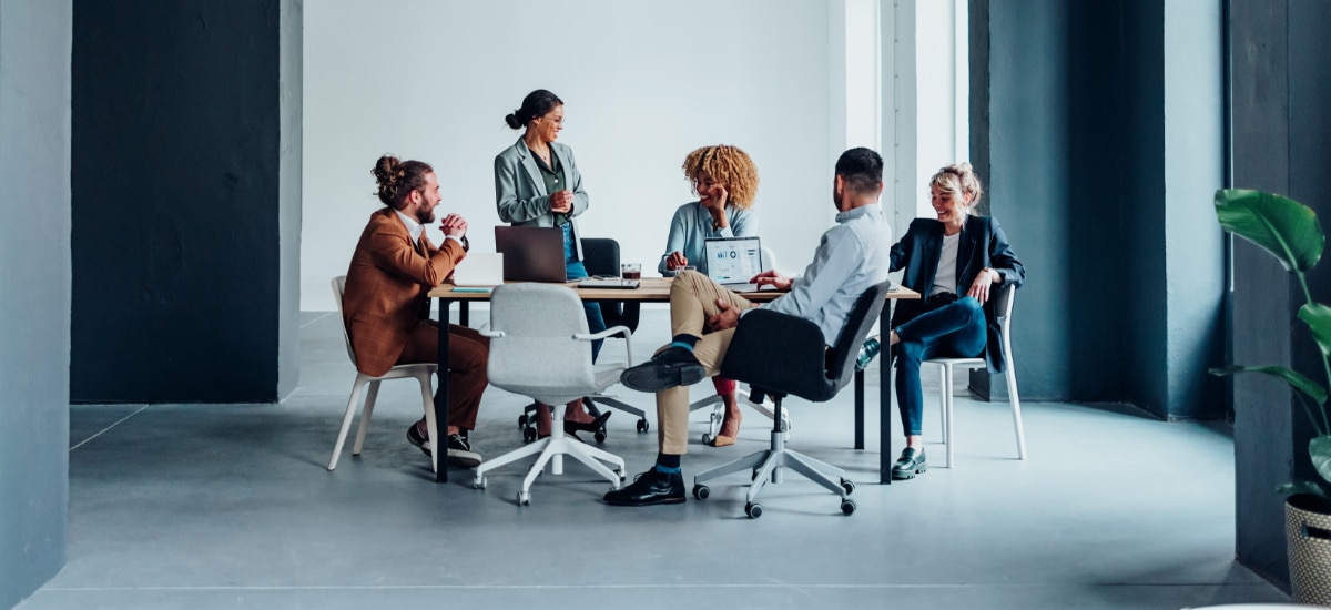 Small business team using laptop computers in an office