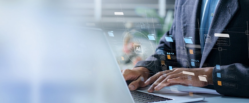 Person typing at computer
