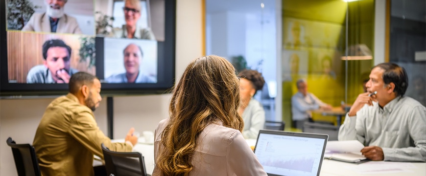 Teams collaborating in hybrid workspaces
