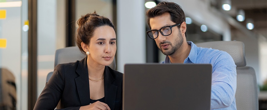 Coworkers reviewing documents