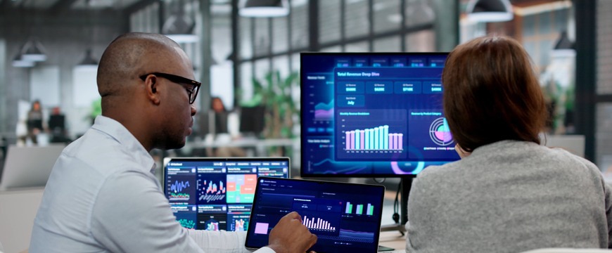 federal employees analyzing data with AI dashboard