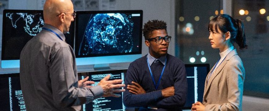 diverse IT professionals collaborating on cybersecurity strategy