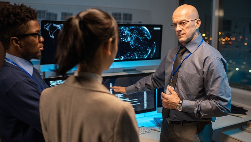 diverse IT professionals collaborating on cybersecurity strategy