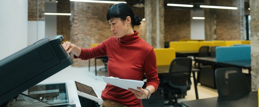 Office employees actively using printers