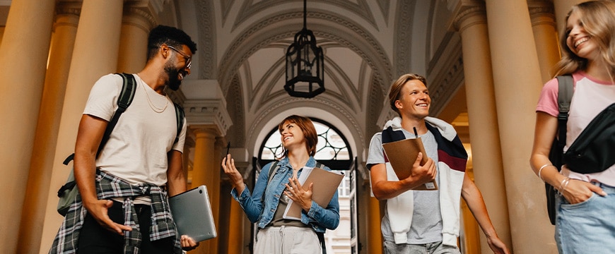Group of happy students together back at school.
