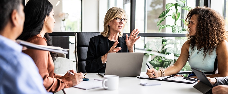 Business colleagues meeting in modern conference room