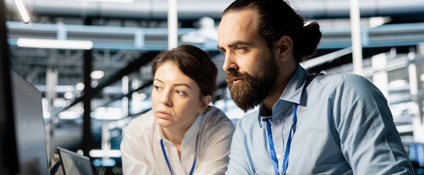 People looking at computer
