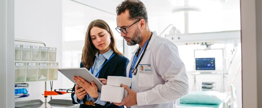 Healthcare professionals using electronic health records with barcode technology