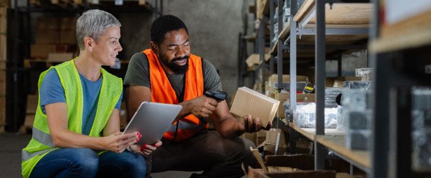 Warehouse and manufacturing employees using rugged mobile scanning devices