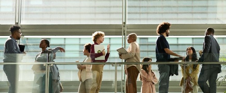 Students and staff accessing devices from smart lockers in education or workplace
