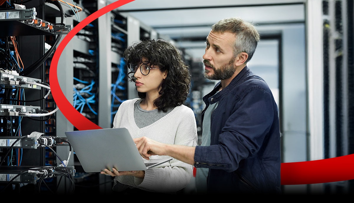 IT professionals managing on-premises cloud infrastructure in a secure data center environment hero