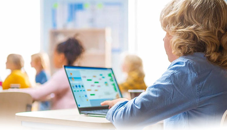 IT professional working on configuring a computer.