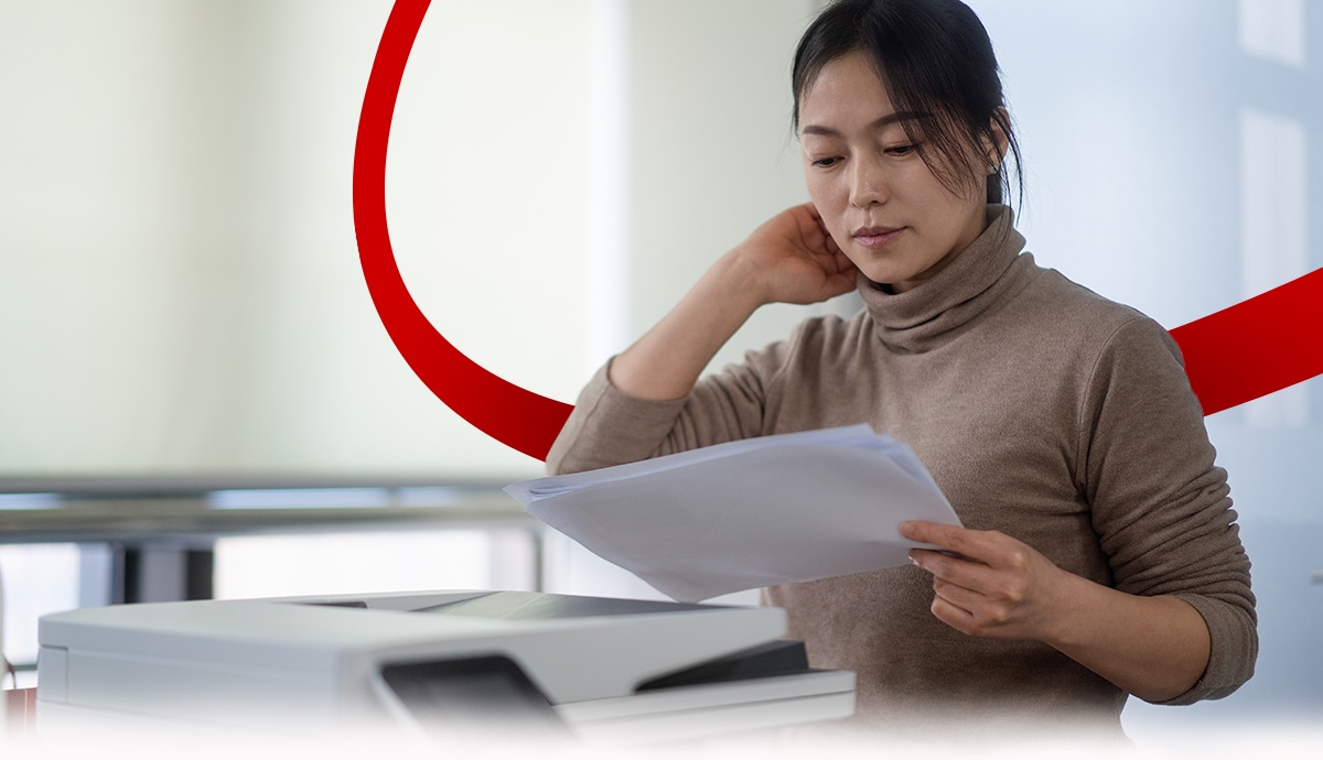CDW print solutions woman using printer