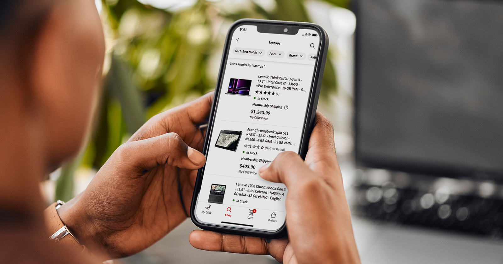 Person Using the Rubi by CDW App on iPhone Smartphone