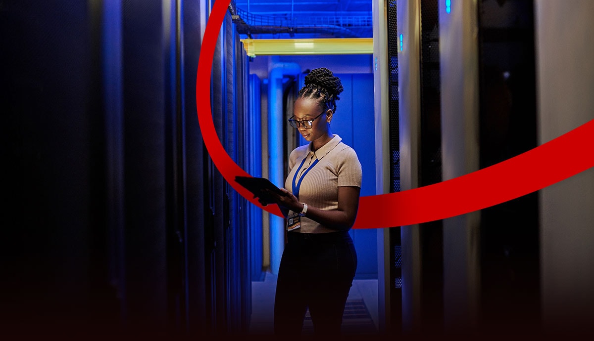 SkyMap Hero - Shot of a young female engineer using a digital tablet while working in a server room