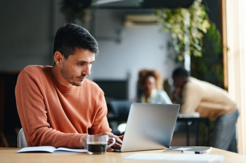 A focused businessman working on his computer.