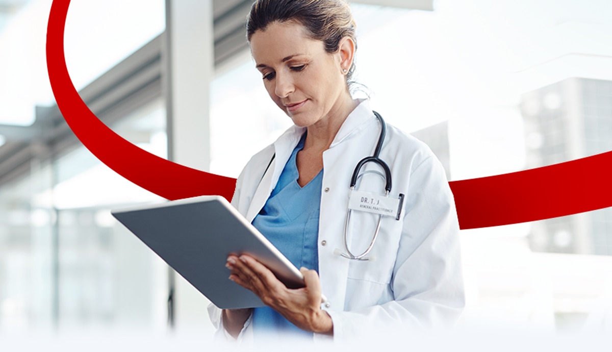 Doctor with tablet computer.