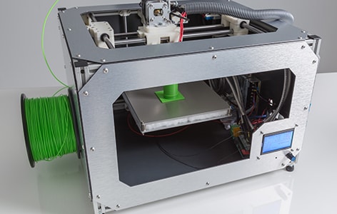 3d printer with bright green filament