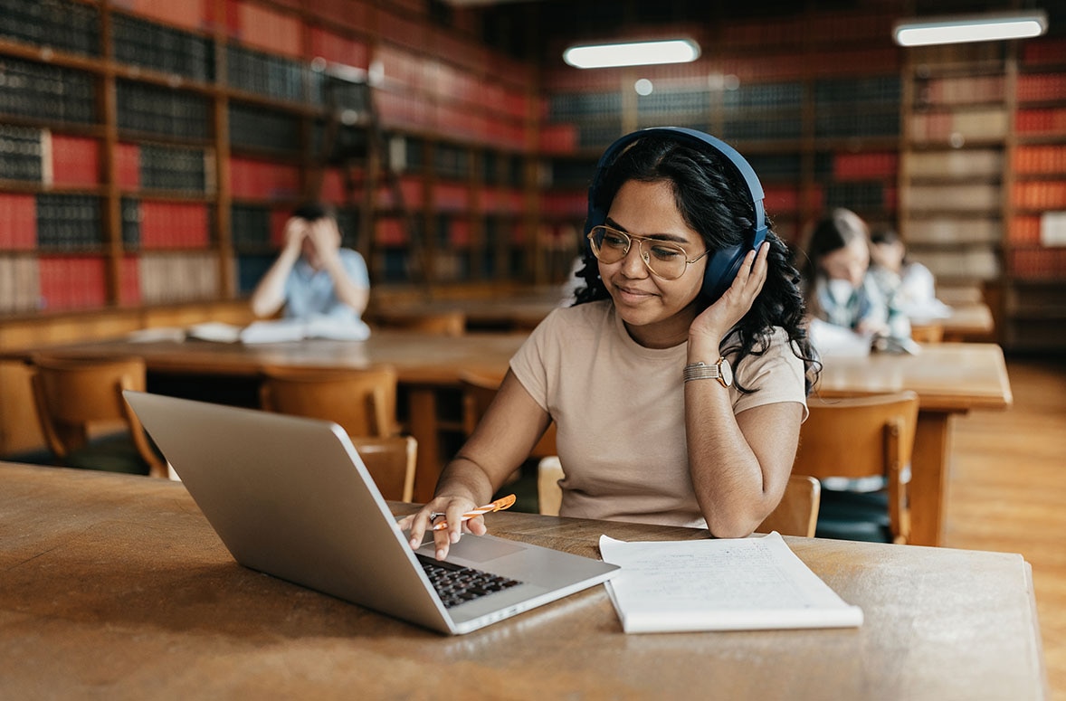 Female student working on the laptop