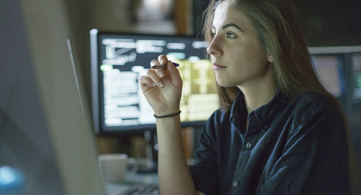 woman-at-desk-two-monitors